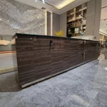 Sophisticated TV Stand with Dark Marble Top, Natural Wood Veneer Panels and Concealed Storage Drawers